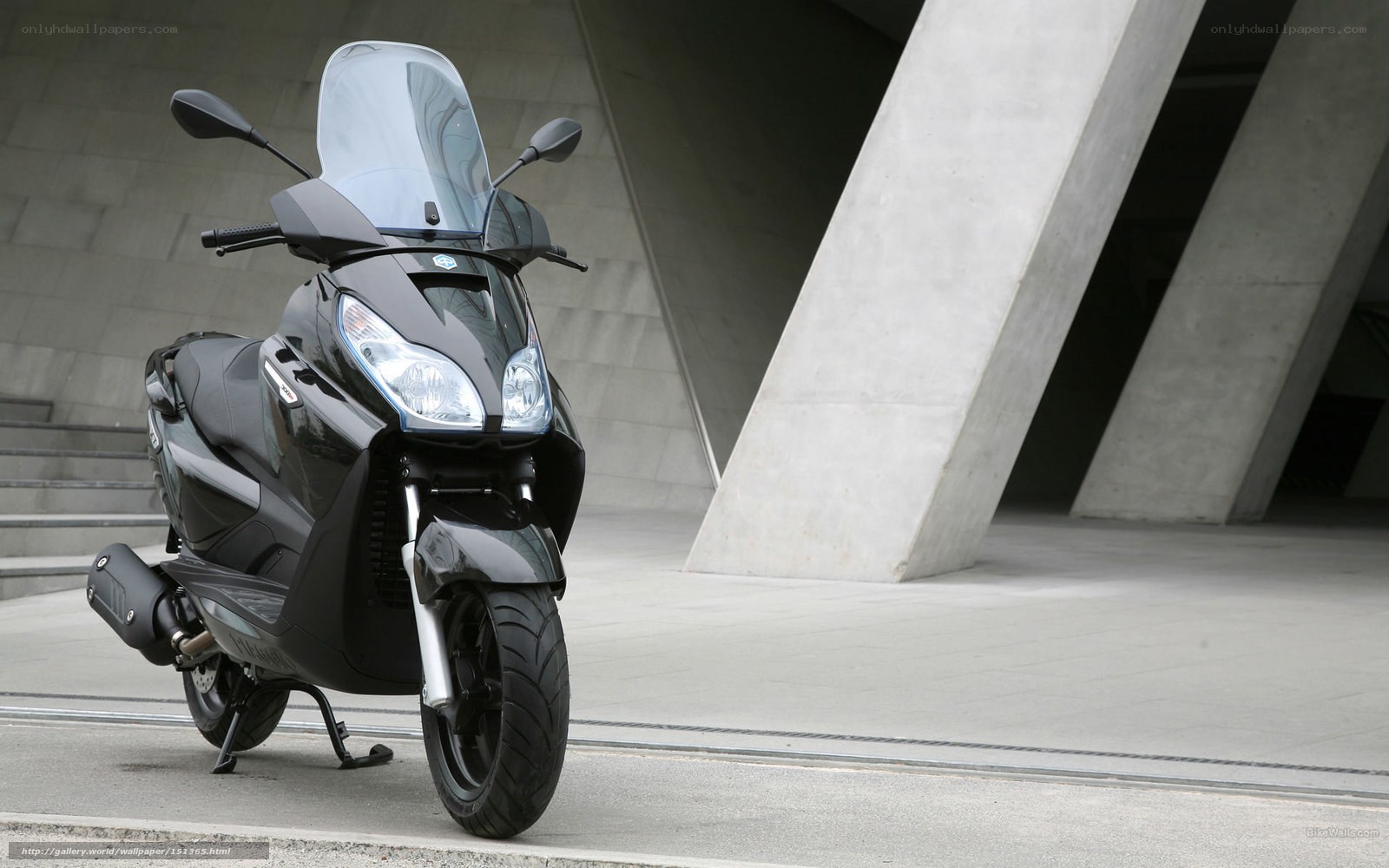 Black scooter in modern architecture