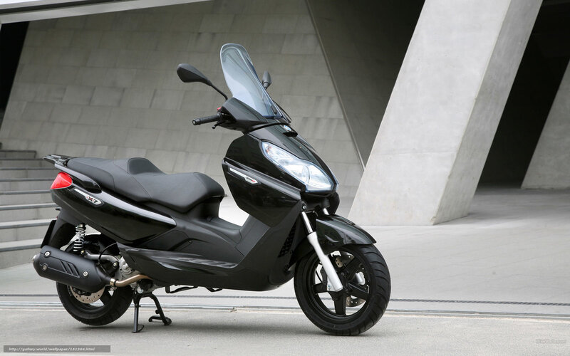 Black scooter in modern setting