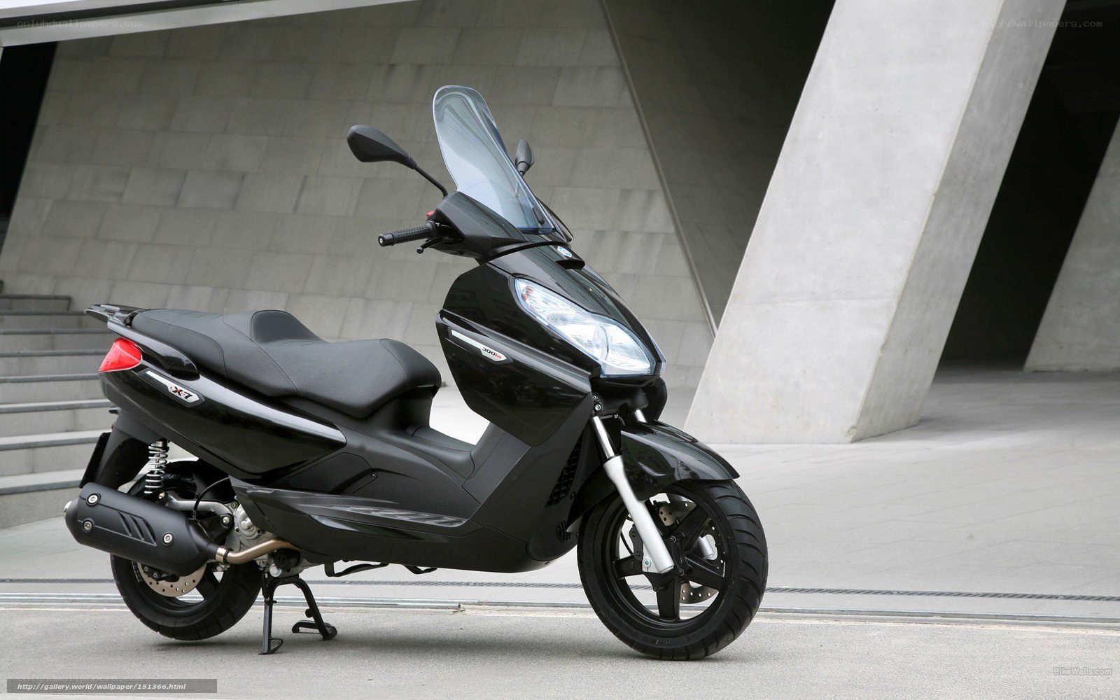 Black scooter in modern setting