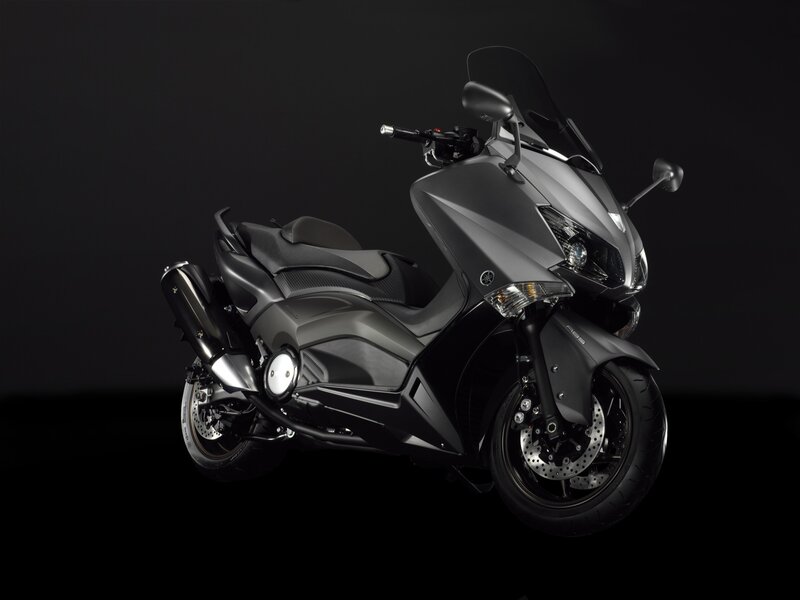 Black Scooter Motorcycle — Dramatic