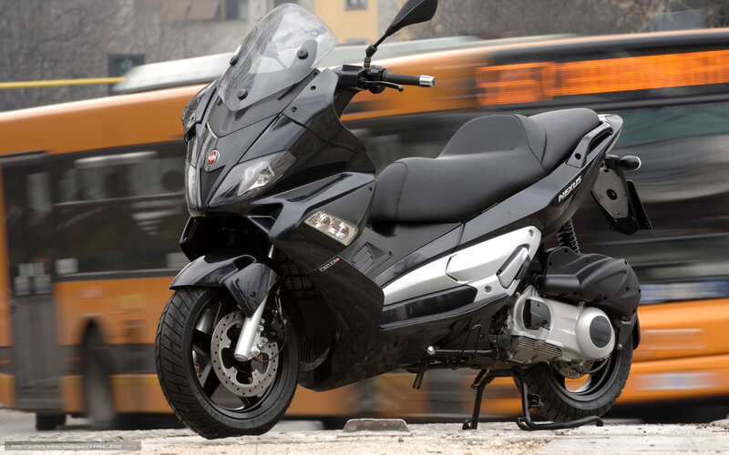 Black scooter on city street