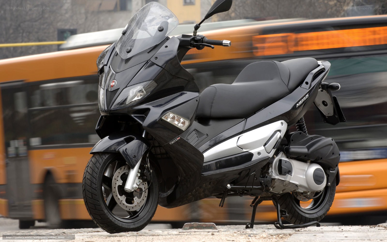Black scooter on city street