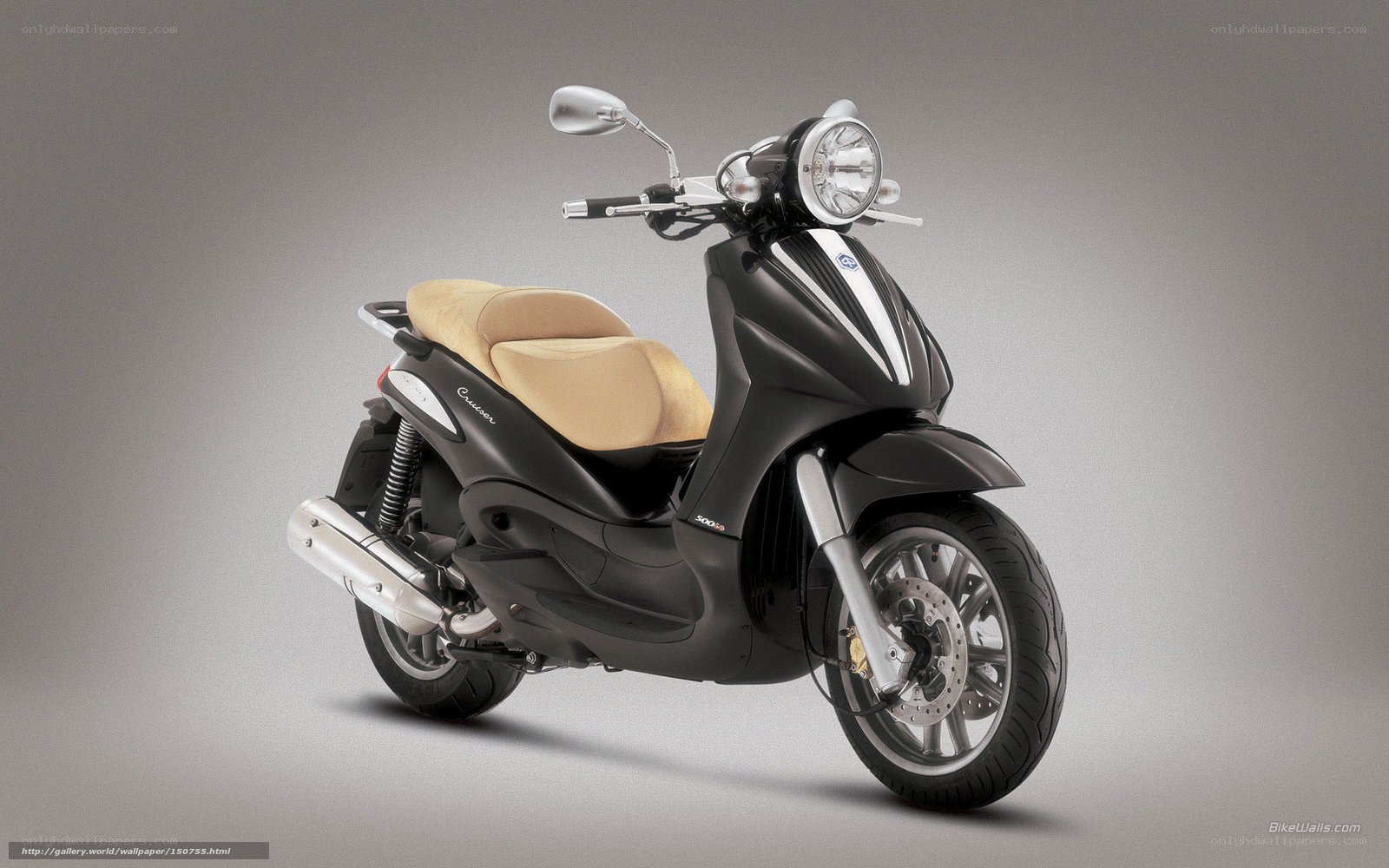 black scooter with beige seat