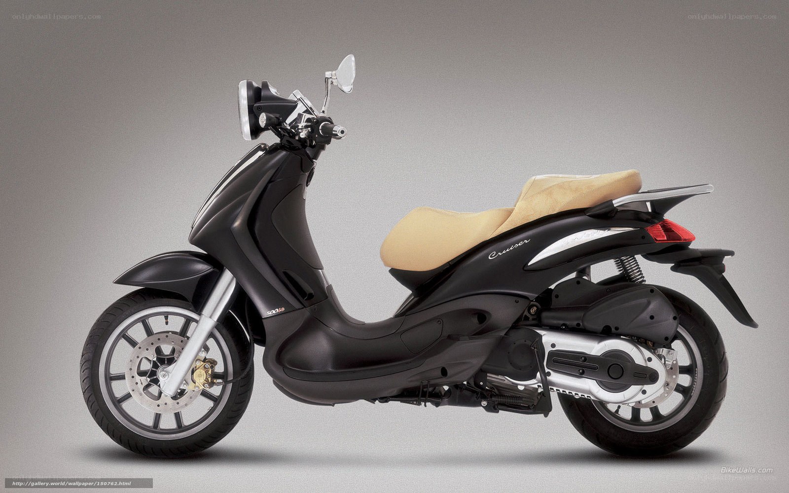 black scooter with beige seat