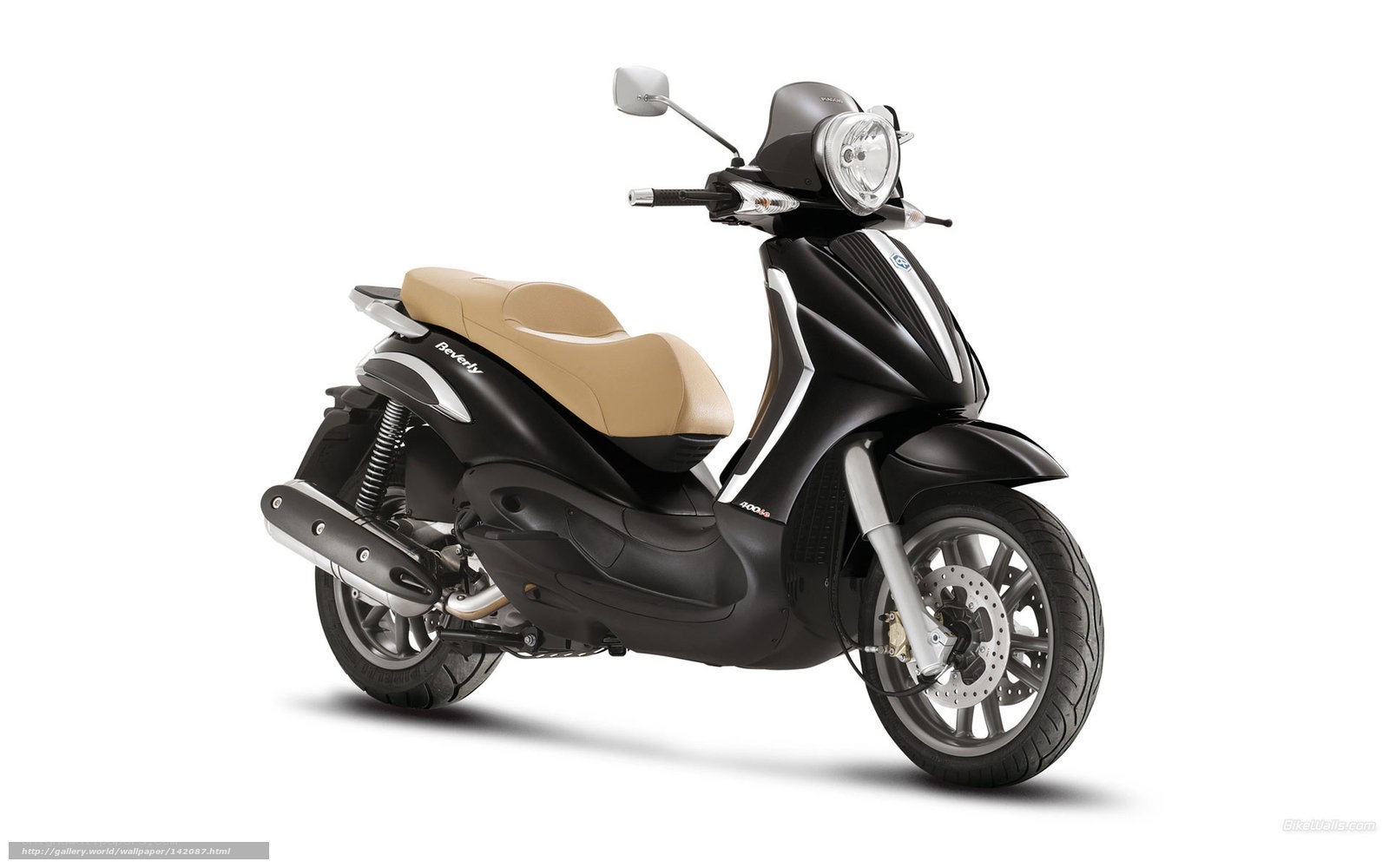 Black scooter with beige seat