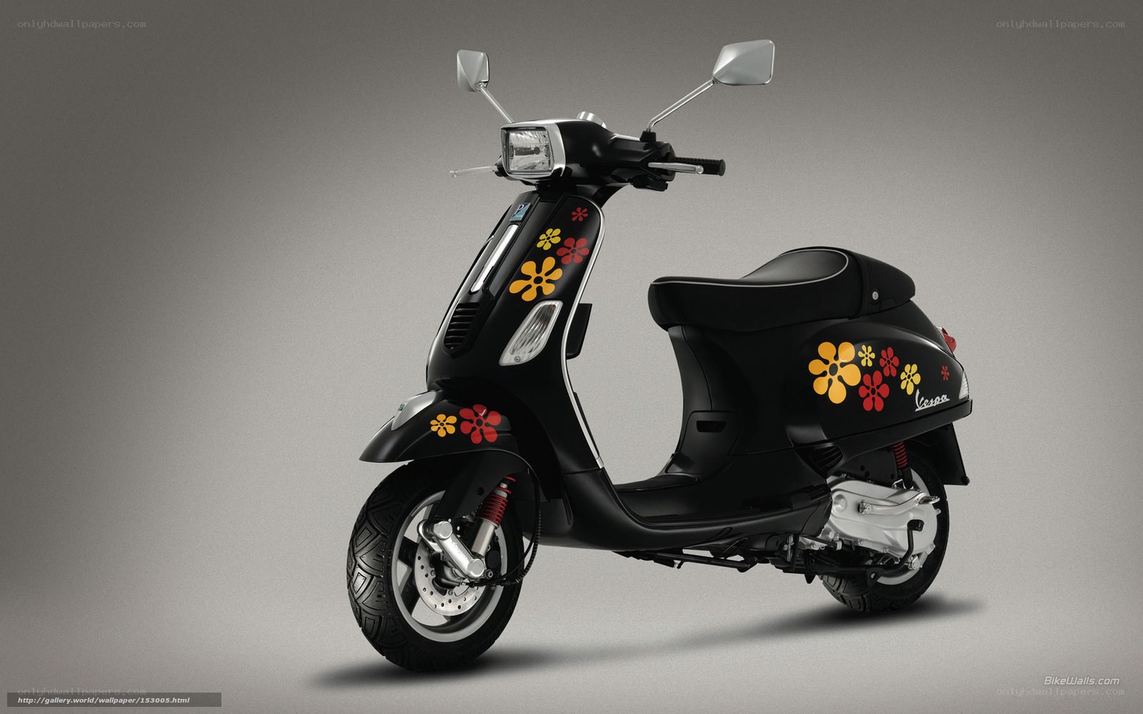 Black scooter with floral decals