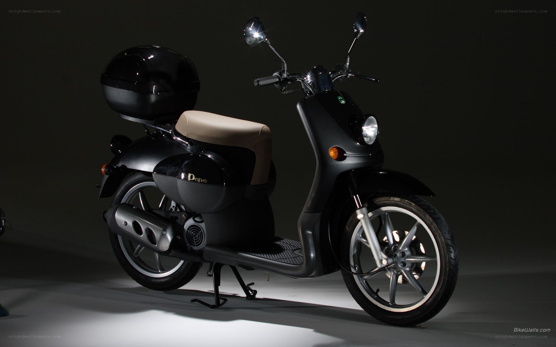 black scooter with helmet