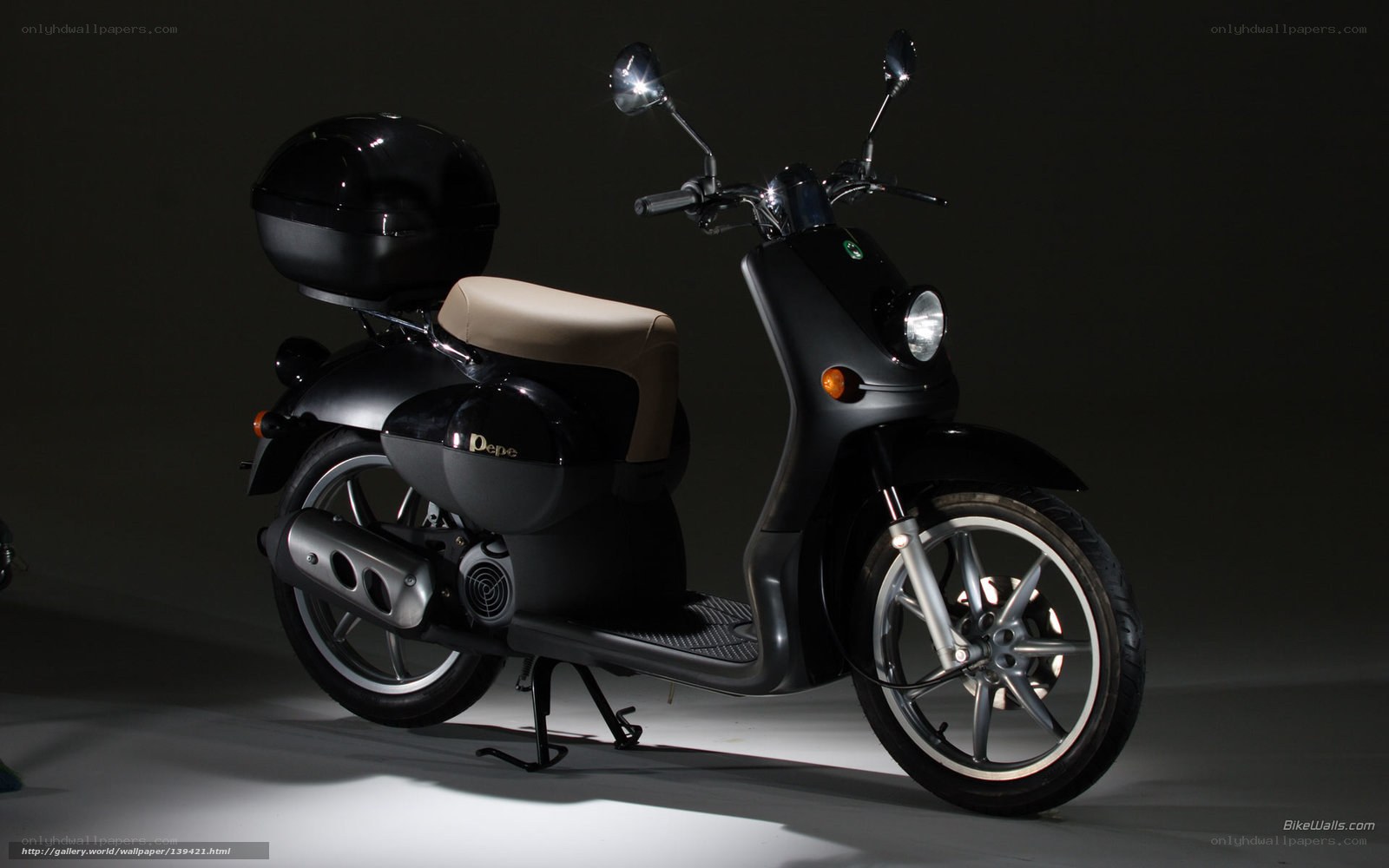 Black scooter with helmet