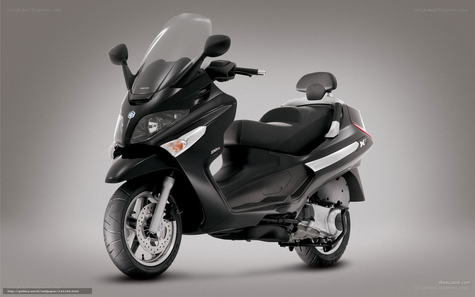 black scooter with windscreen