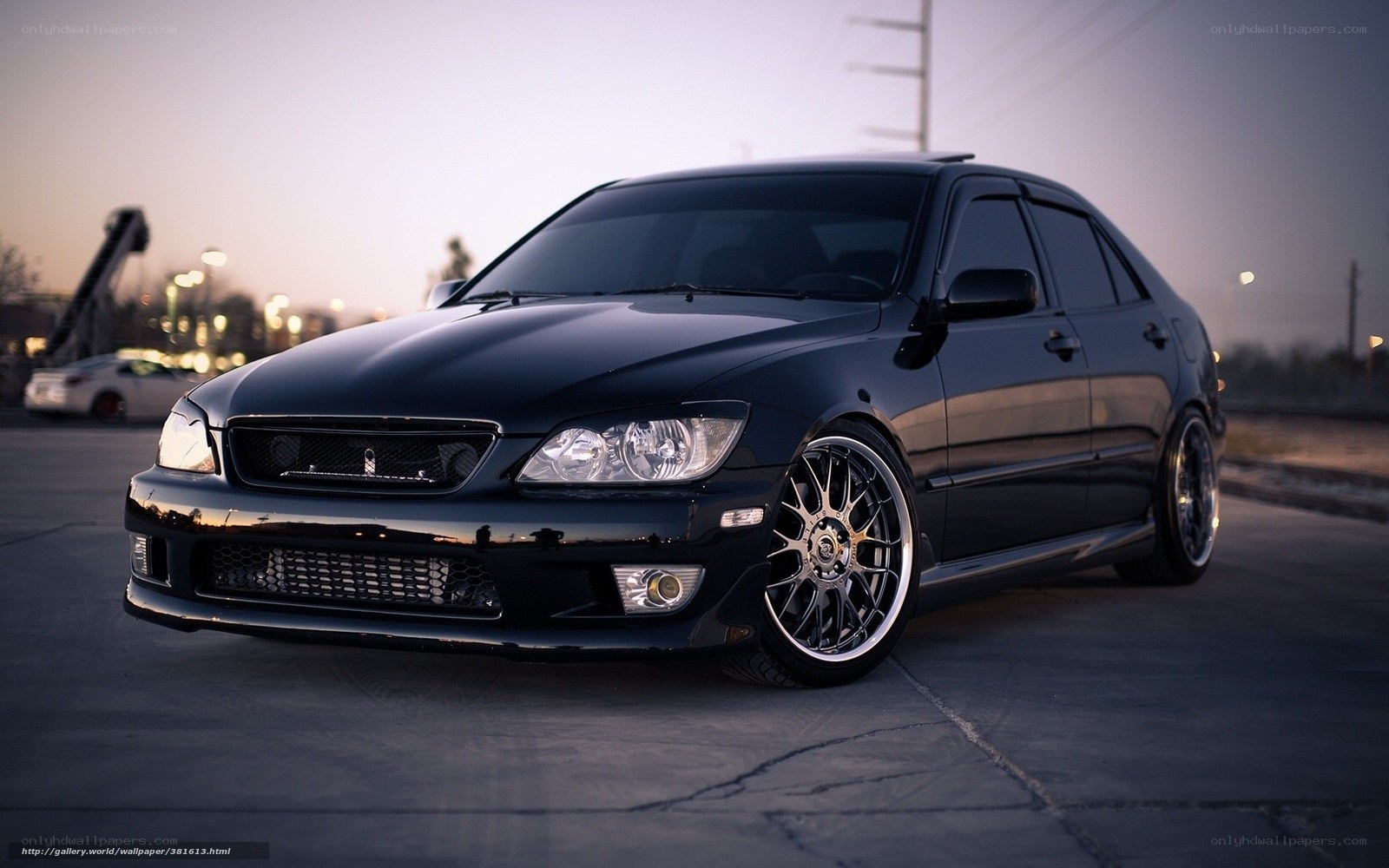 black sedan at dusk