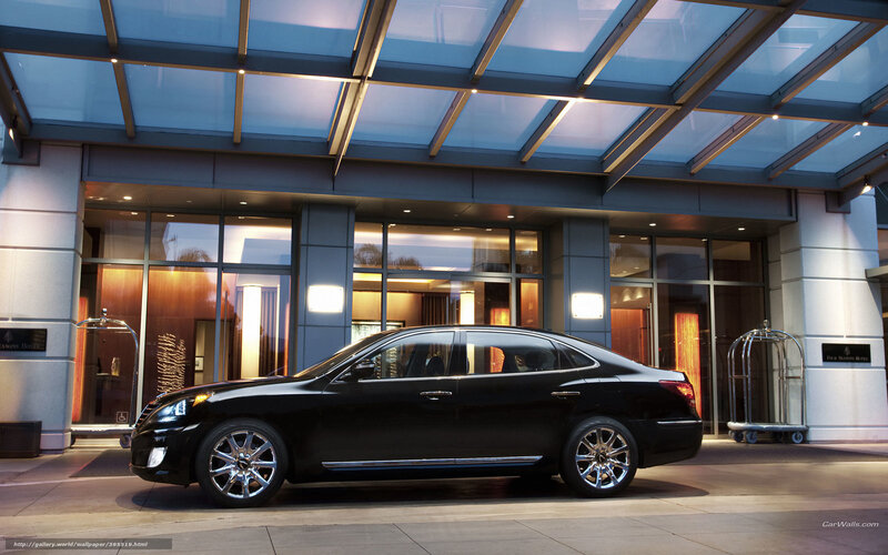 Black sedan at hotel entrance
