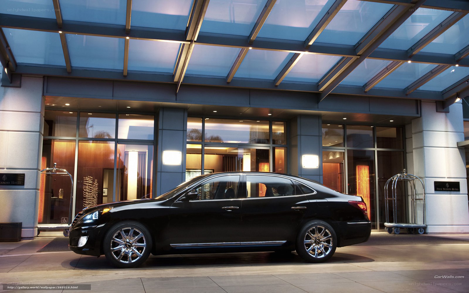 Black sedan at hotel entrance