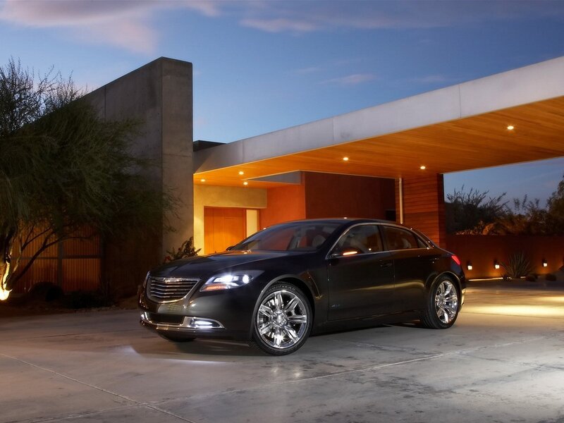 Black sedan at modern home