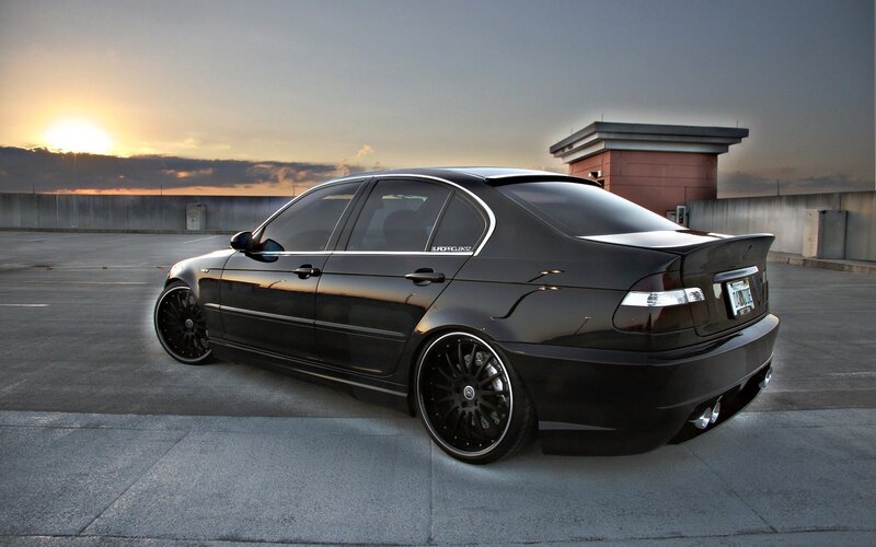 black sedan at sunset