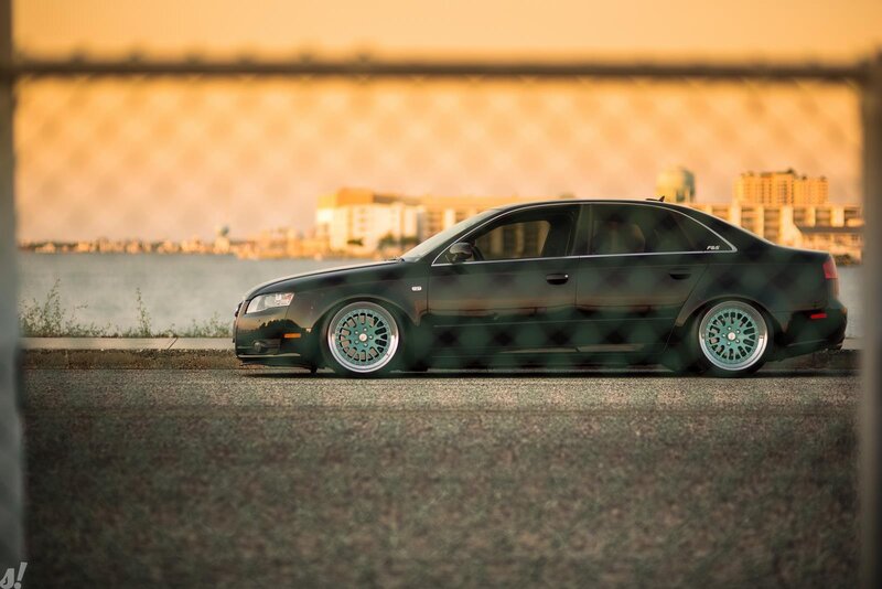 black sedan at sunset