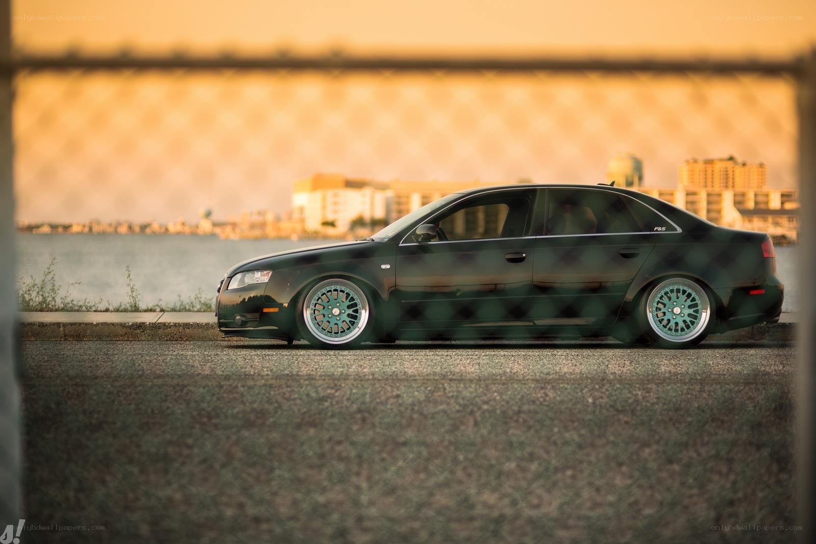 black sedan at sunset