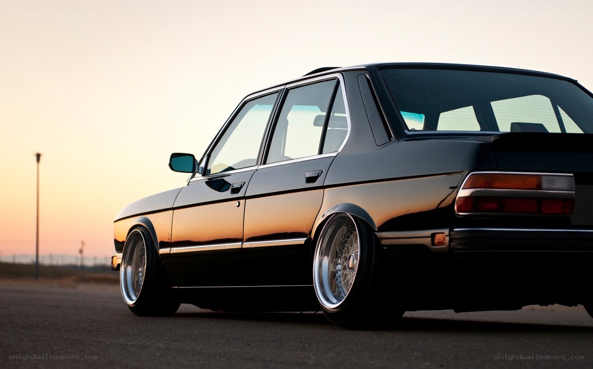 black sedan at sunset