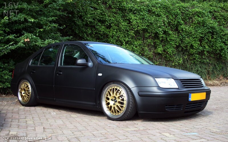Black Sedan Car — Calm, Afternoon, Photograph, Gold Wheels