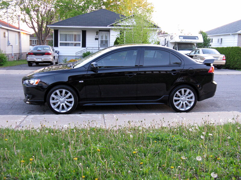 Black Sedan Car — Calm, Afternoon, Photograph, House, Caravan