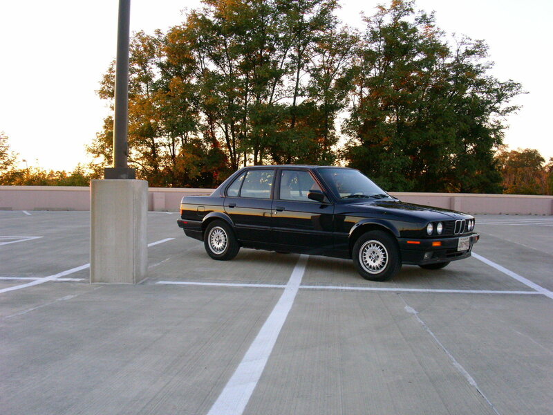 Black Sedan Car — Calm, Sunset, Photograph, Parking Lot