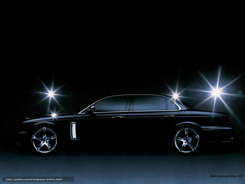 black sedan car in spotlight