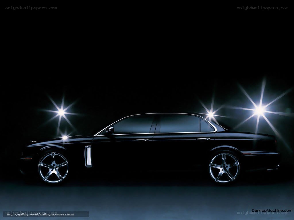 black sedan car in spotlight