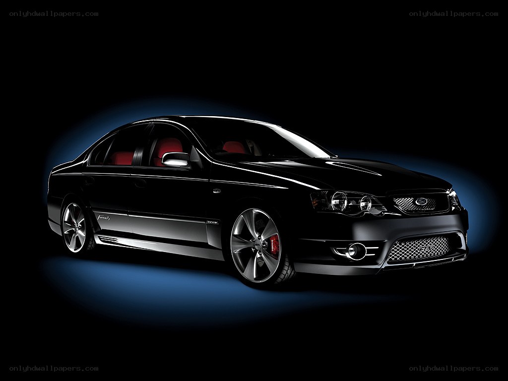 black sedan car on dark background
