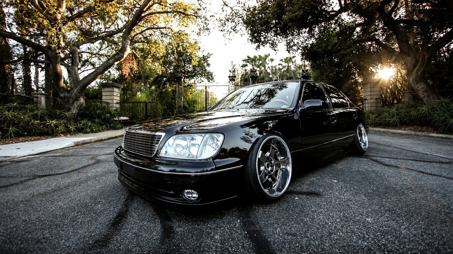 black sedan in a park