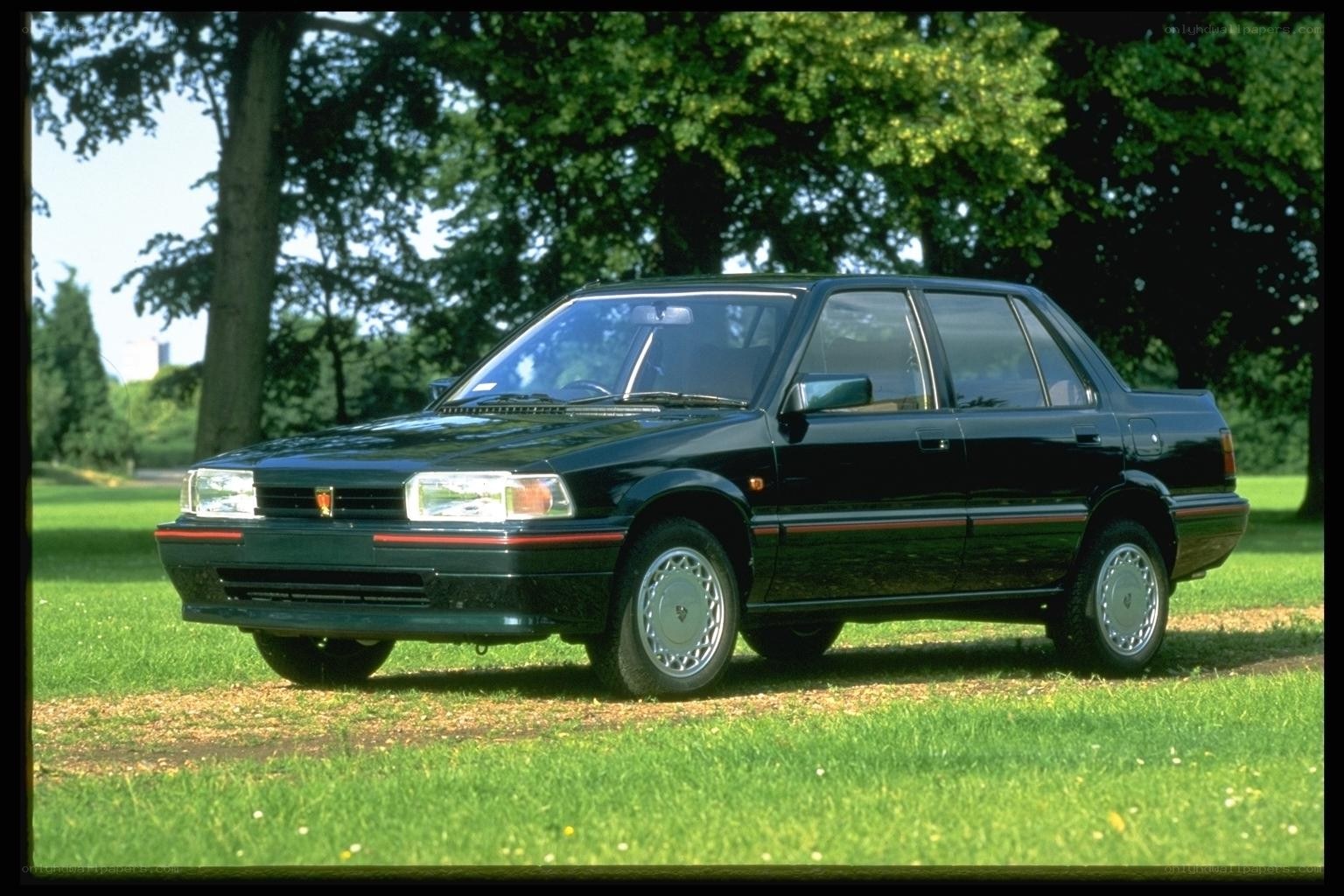 black sedan in a park