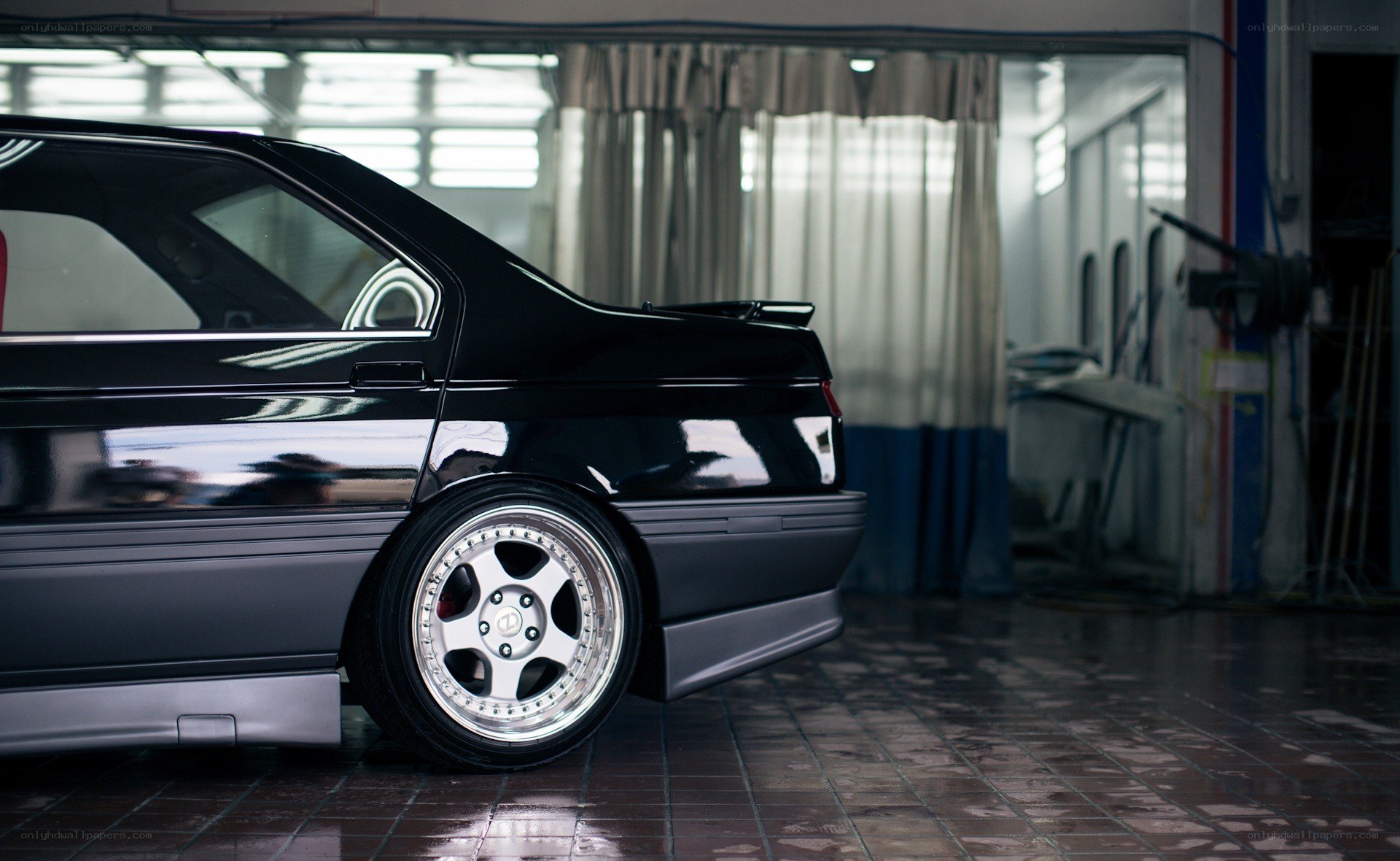 black sedan in garage