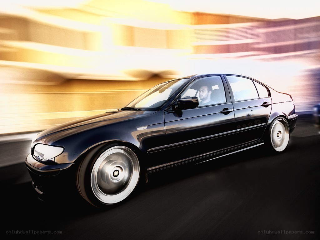 black sedan in motion