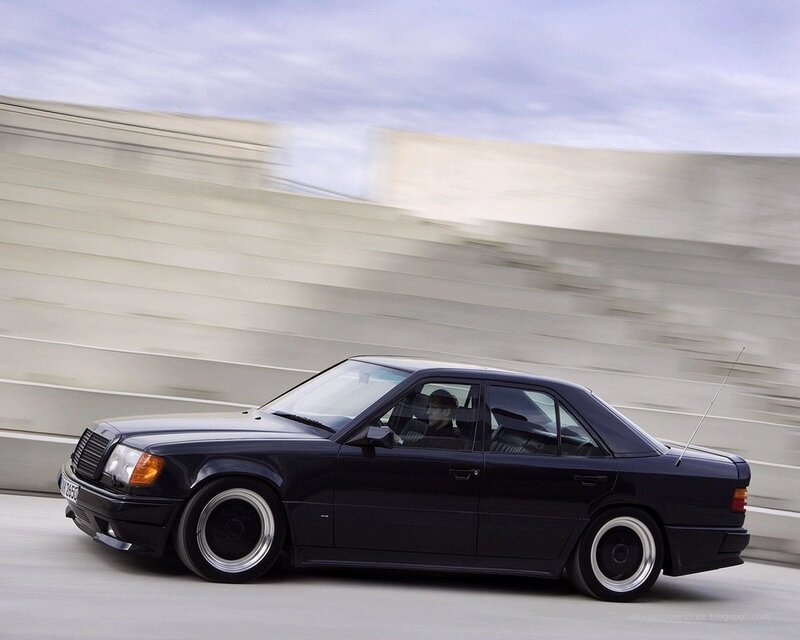 black sedan in motion