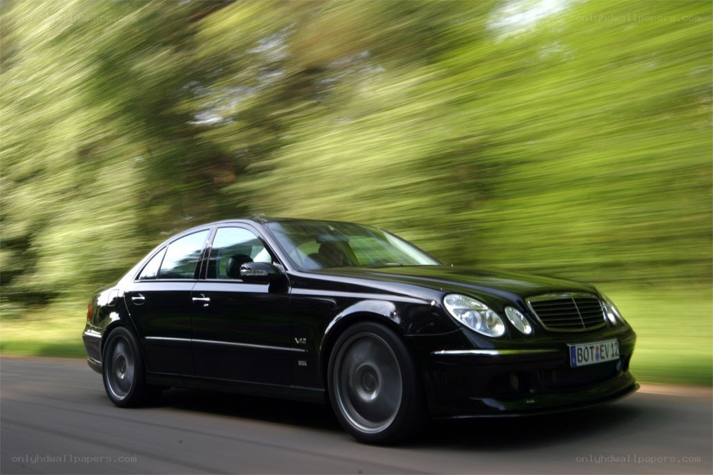 black sedan in motion