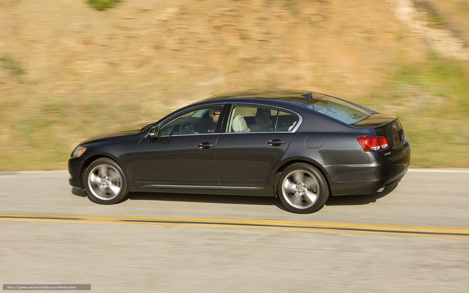 black sedan in motion