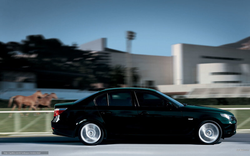 Black sedan in motion