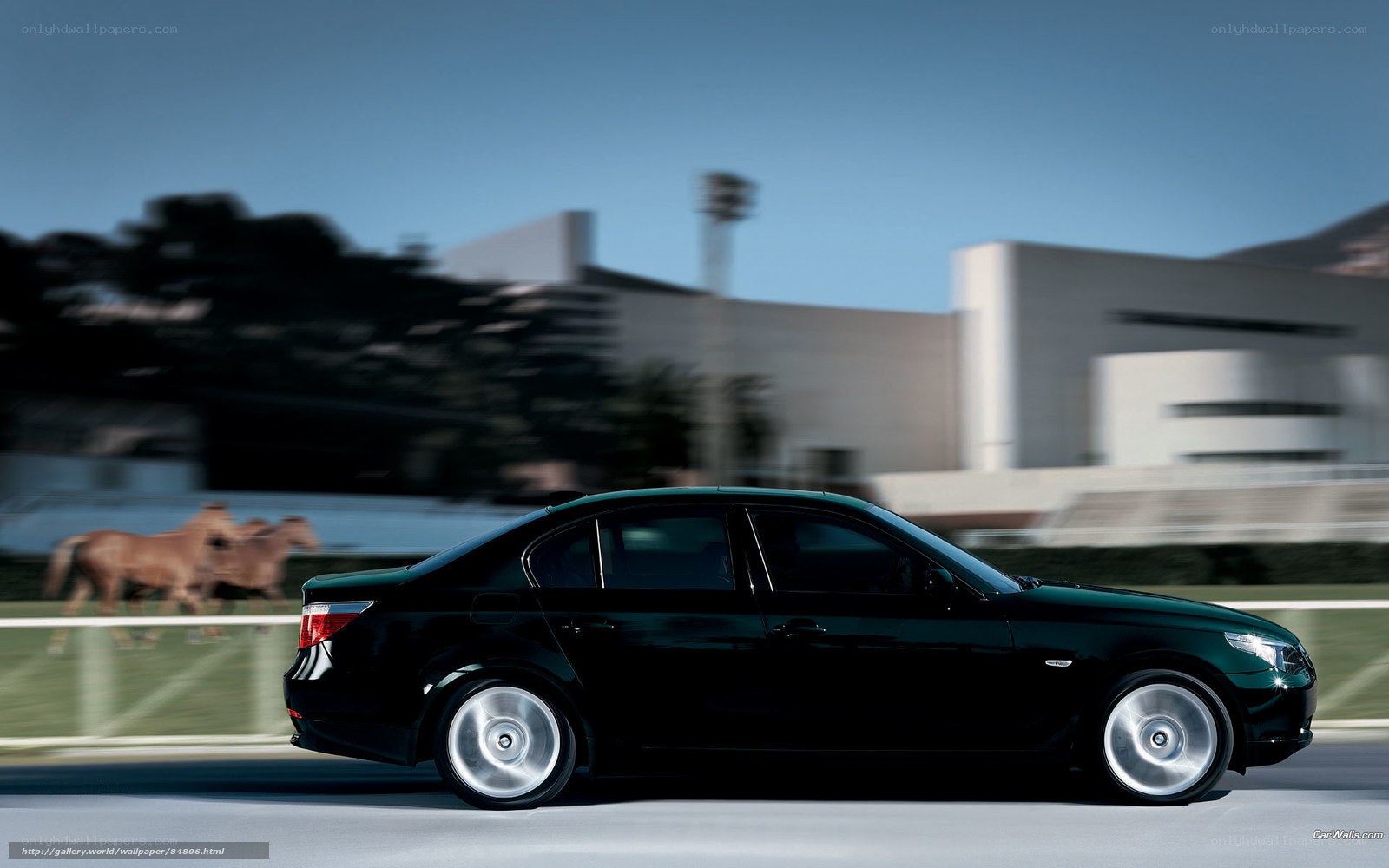 Black sedan in motion