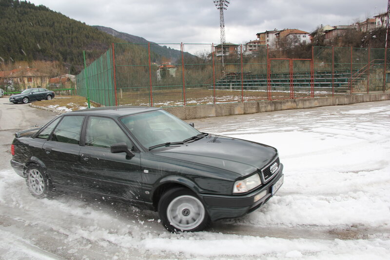 Black Sedan in Snow