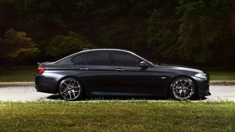 black sedan on a quiet street