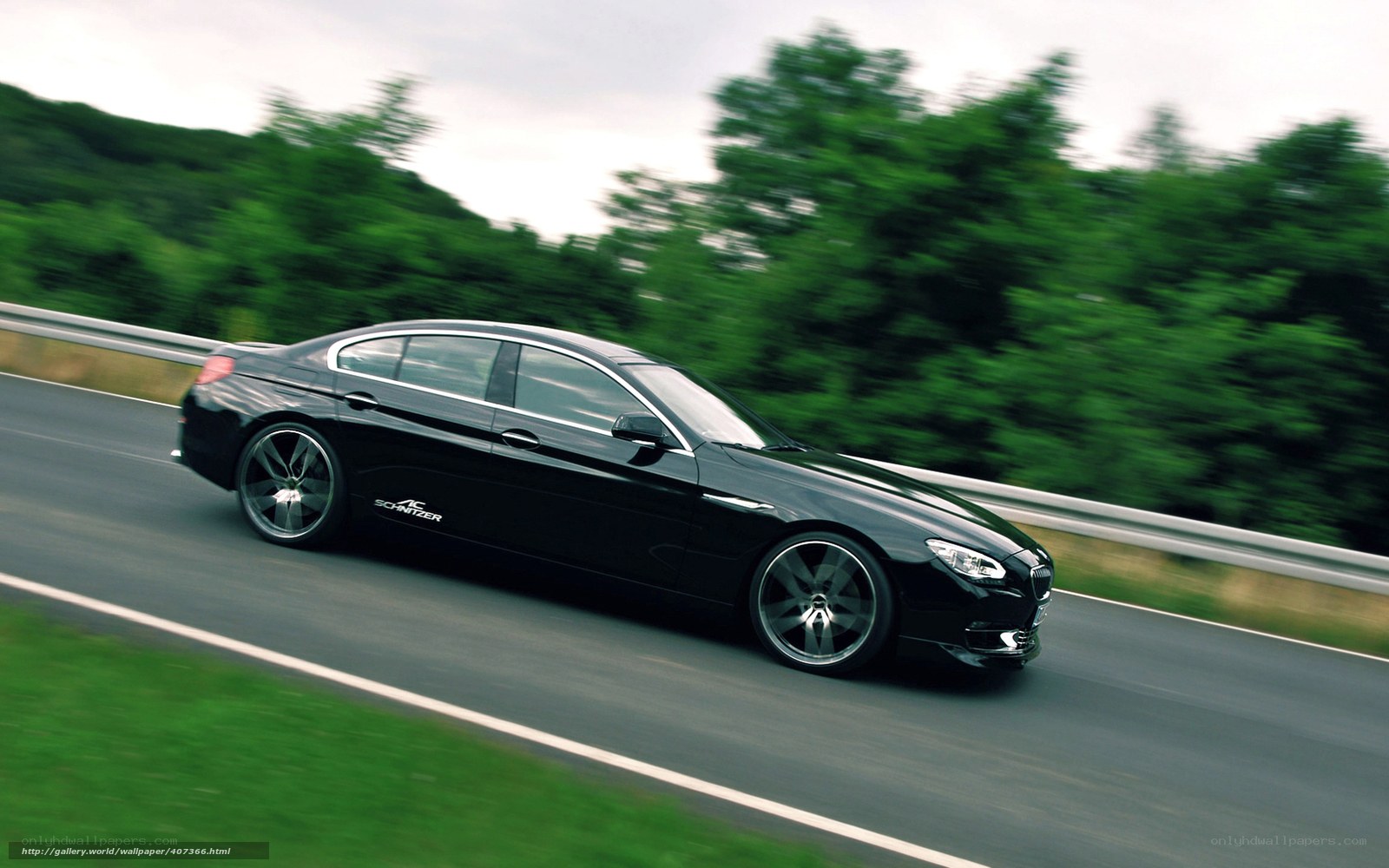 black sedan on a road