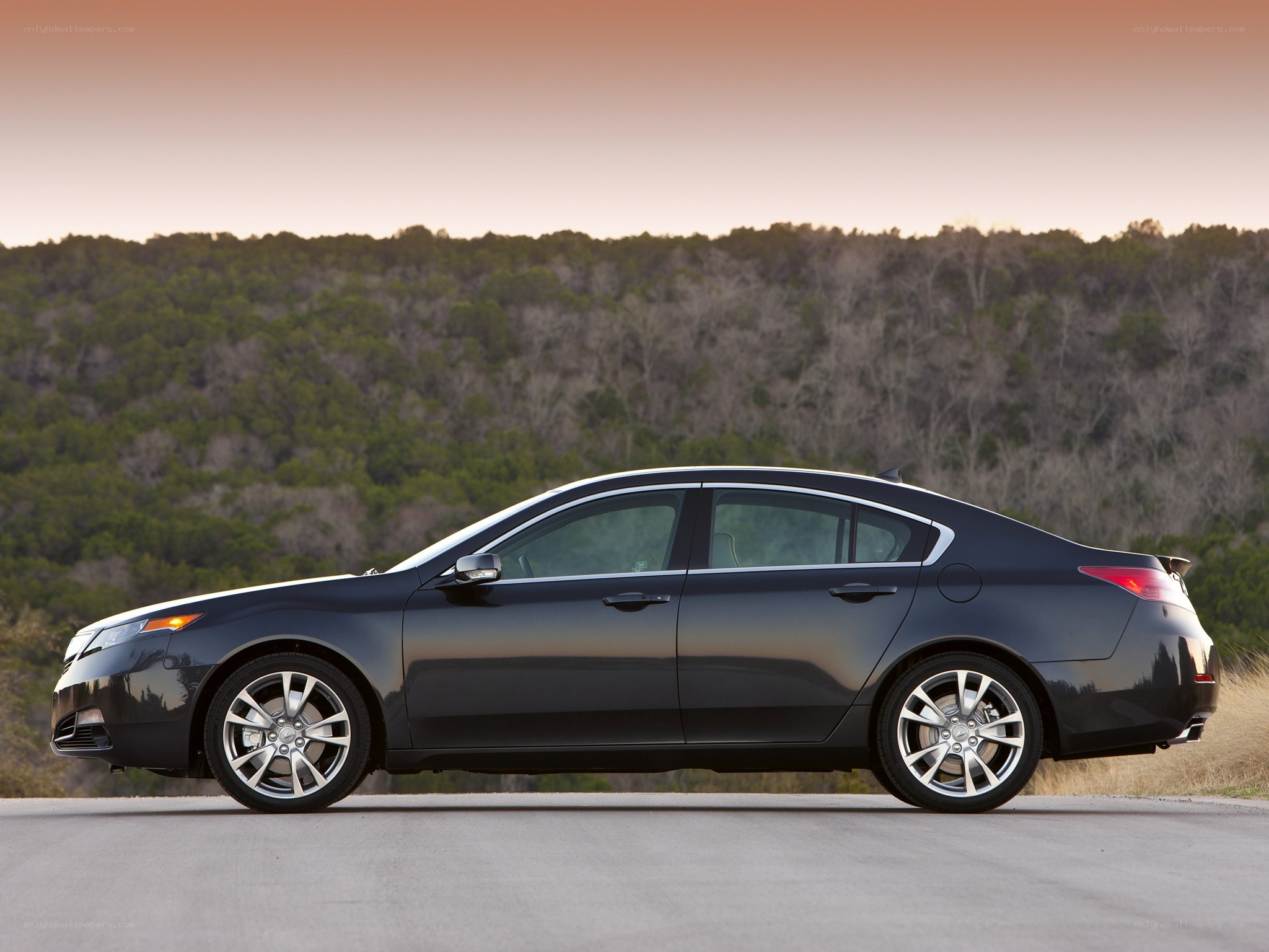 black sedan on a road