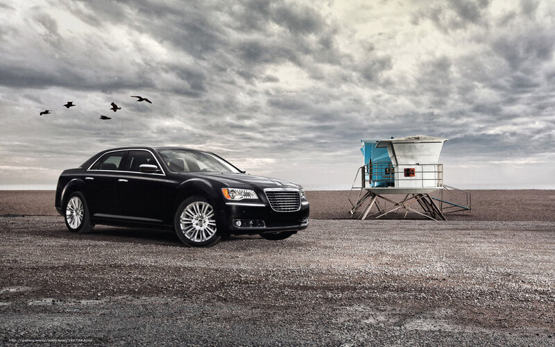 Black Sedan on Beach
