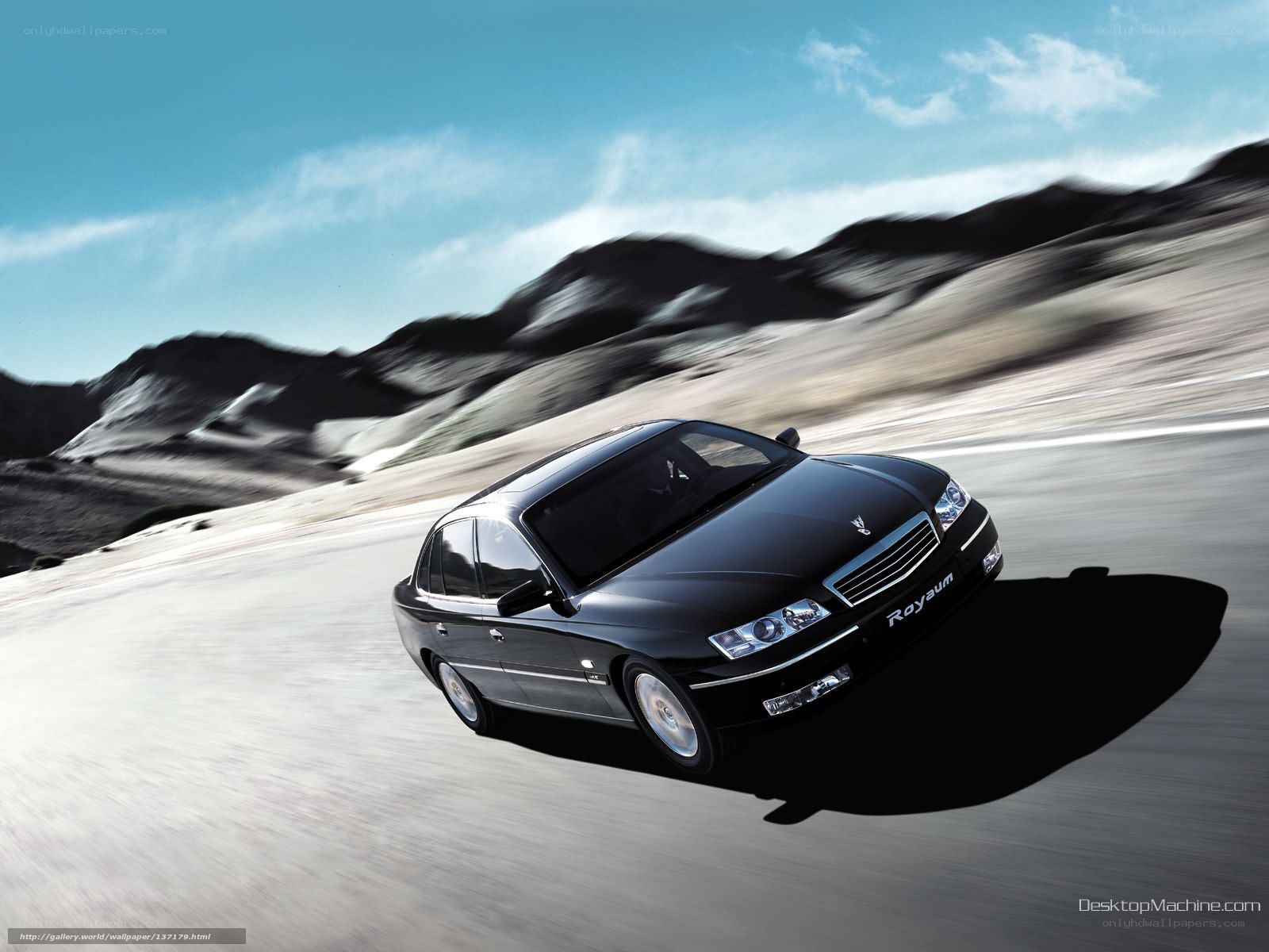 black sedan on desert road