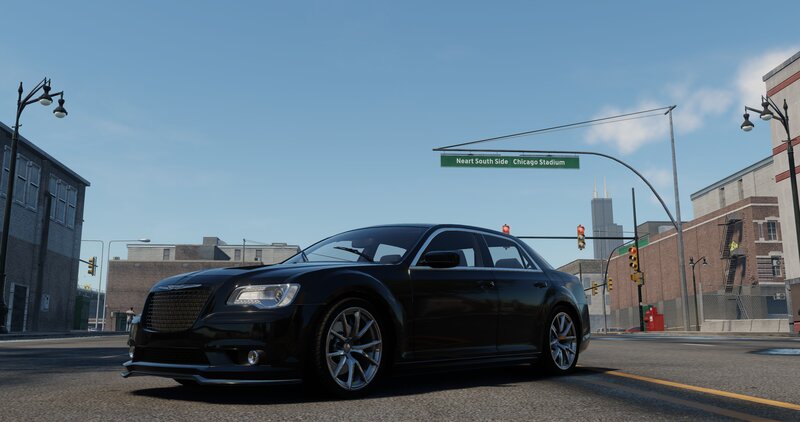 Black Sedan on Street — Calm