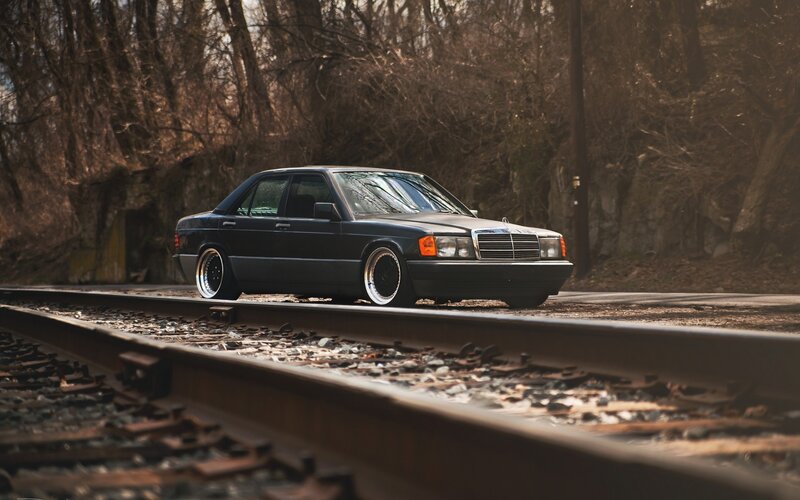Black Sedan on Train Tracks — Dramatic, Autumn