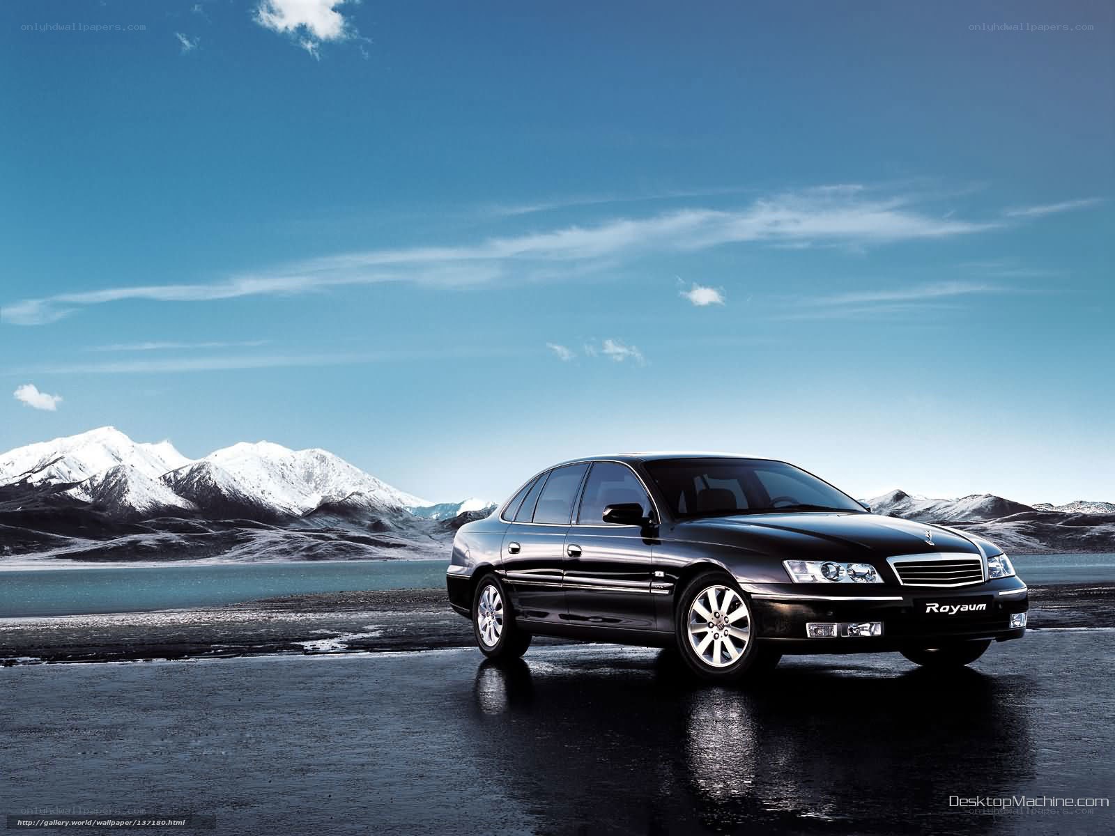 Black sedan on wet road