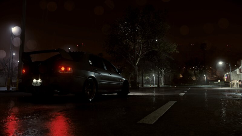 Black Sedan on Wet Street
