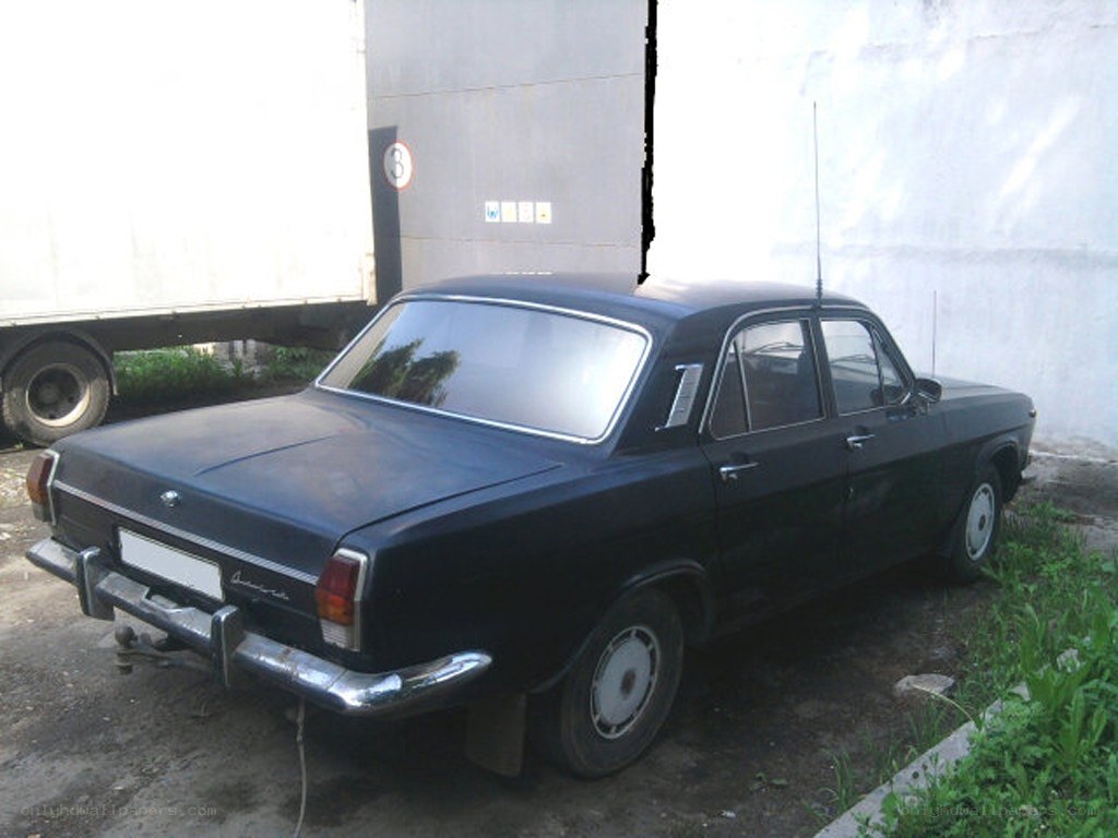 black sedan parked outside
