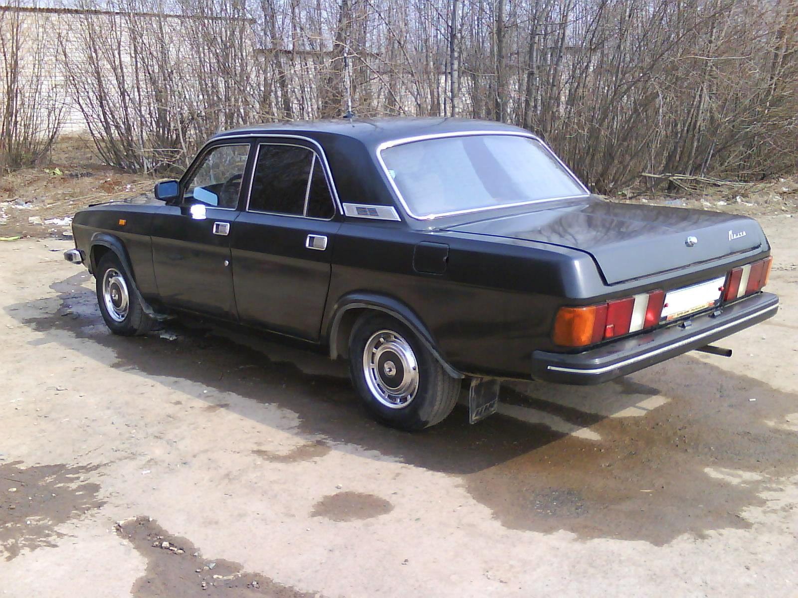 black sedan parked outside