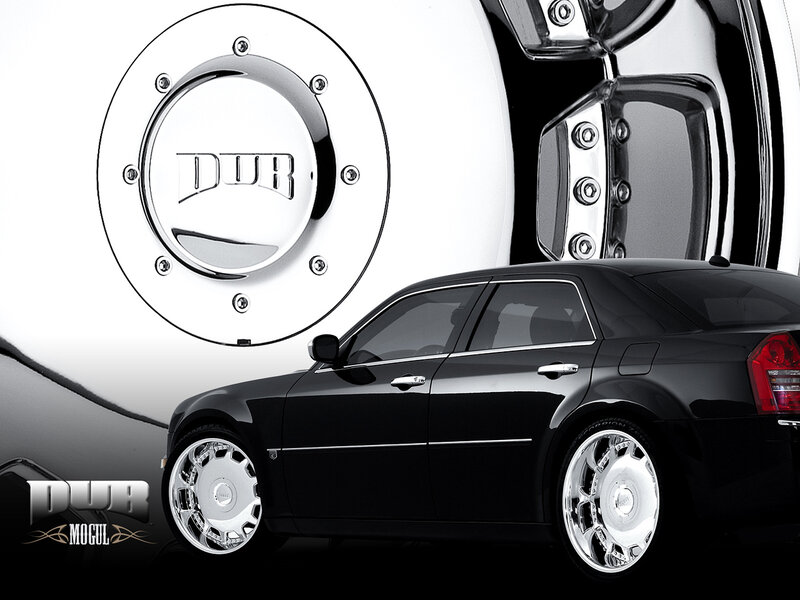 Black sedan with chrome wheels