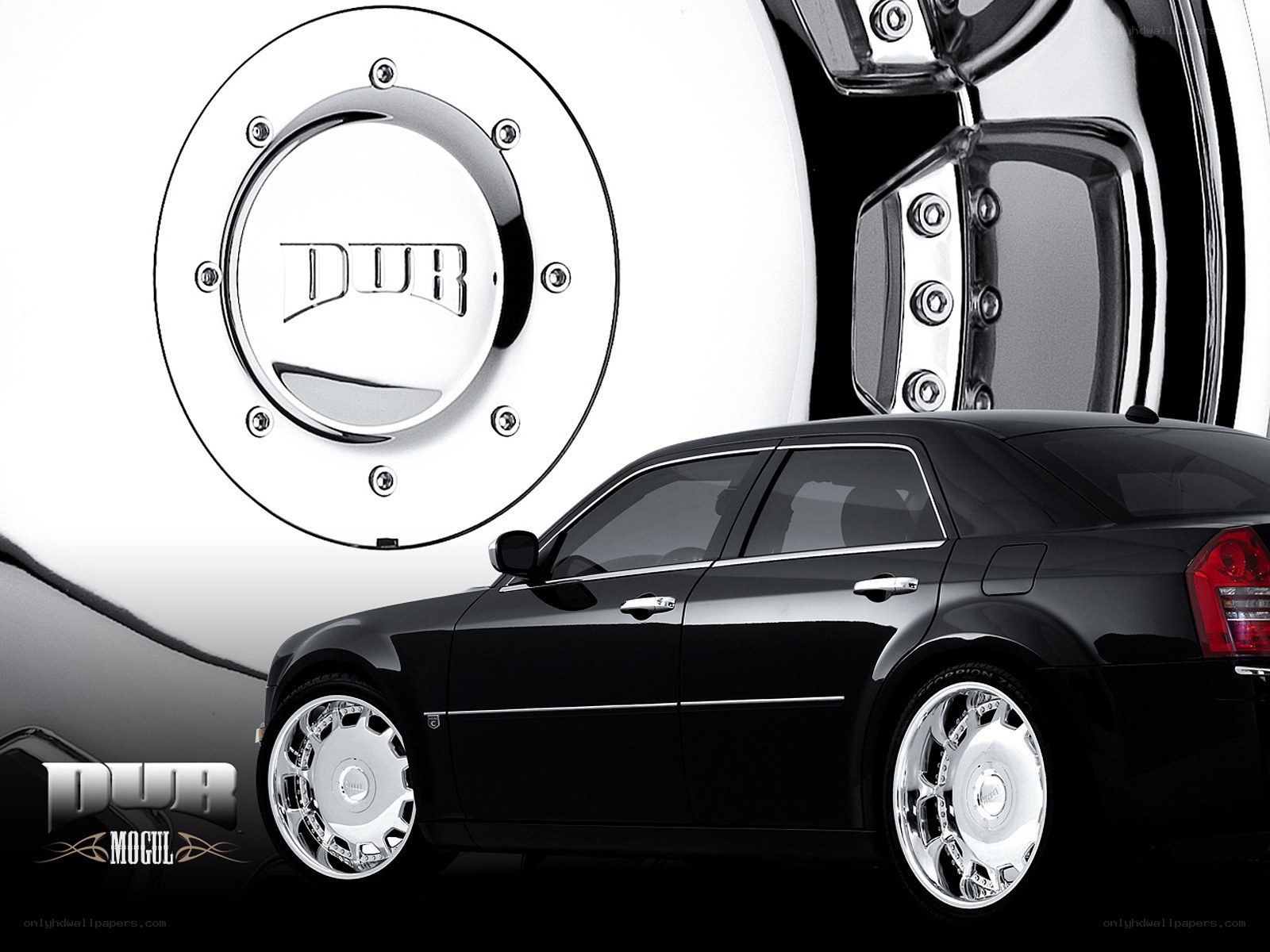 Black sedan with chrome wheels